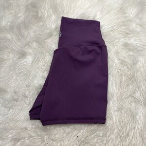 Ptula Cassey Short in the color Viola;  4”